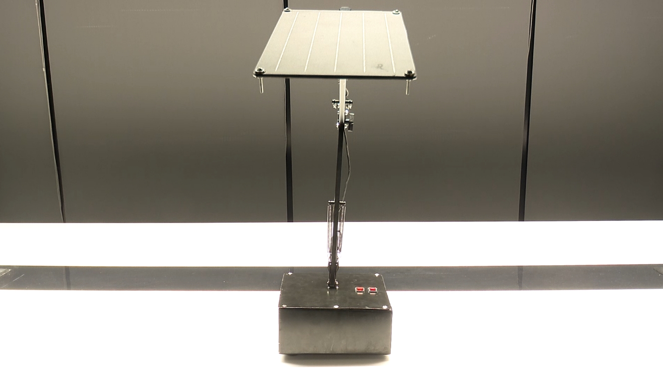Front view of the lamp with articulated arm
